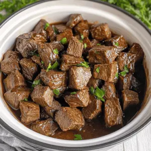 Tender, juicy slow cooker steak bites are perfect for busy nights! Made with simple ingredients like beef chunks, garlic, and a touch of soy sauce, this recipe delivers delicious comfort in every bite. Great for game days or family dinners, be sure to save this recipe for your next hearty meal!