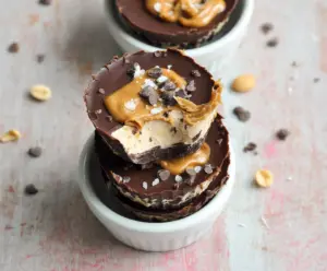Delicious Greek yogurt and peanut butter protein cups on a plate, perfect for a healthy snack.