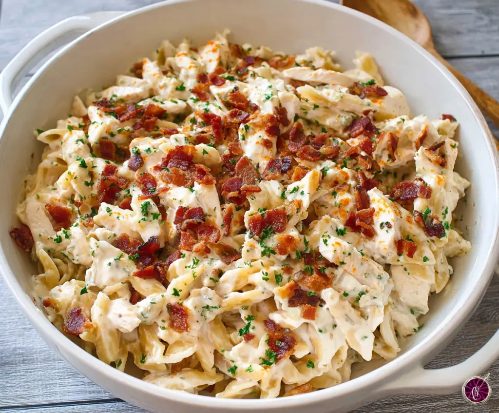Delicious Chicken Bacon Ranch Pasta served in a bowl with garnishes