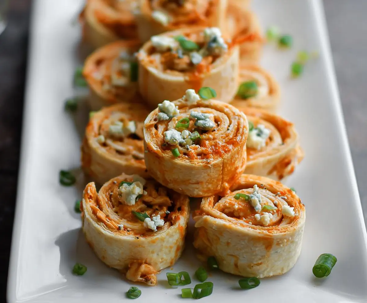 Delicious Buffalo Chicken Pinwheels with flaky pastry and spicy buffalo sauce