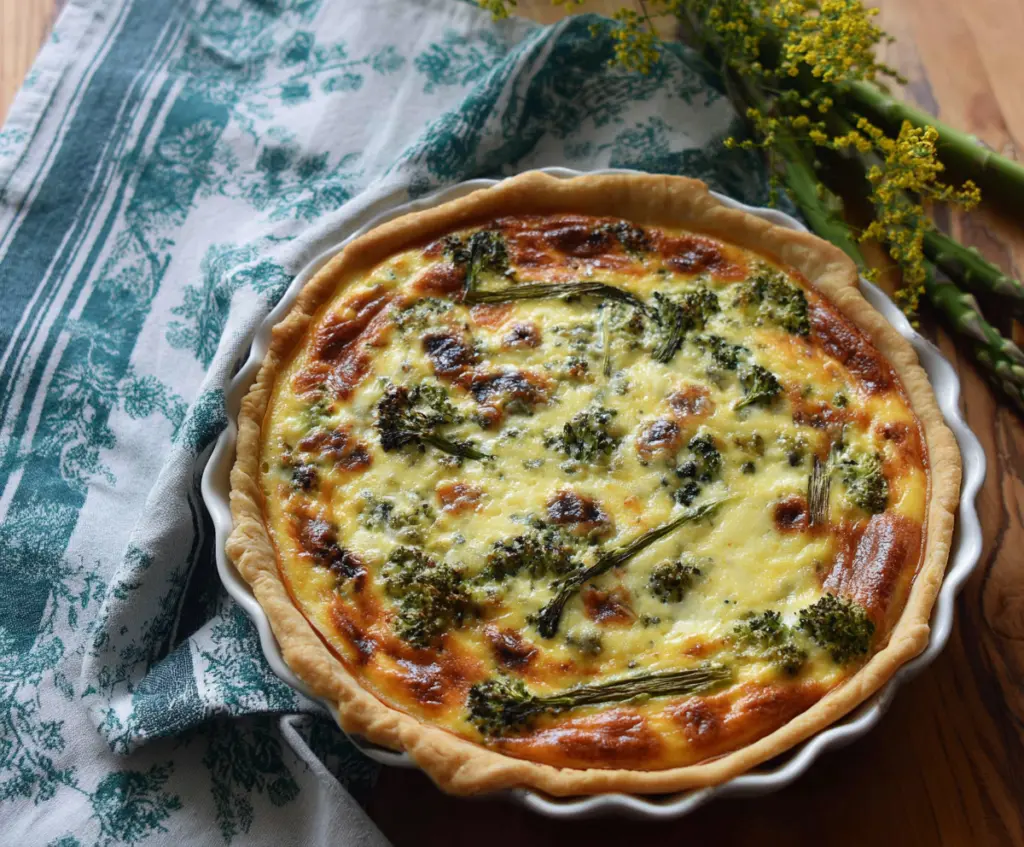 Delicious Easter brunch quiche with fresh ingredients and golden crust on a festive table.